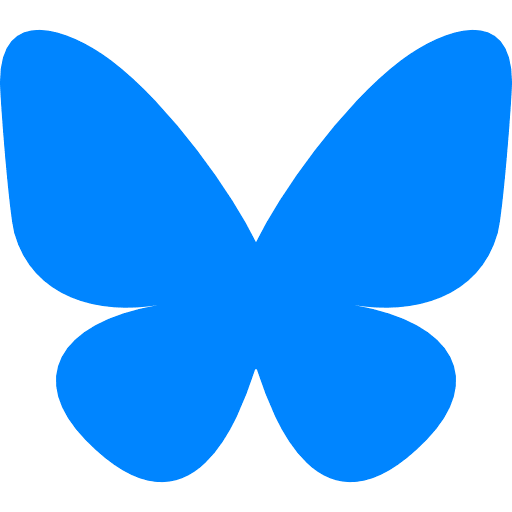 Solid blue butterfly silhouette on white background, representing nature and simplicity in minimalist design